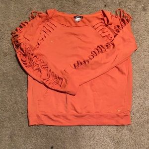 Orange ripped sweatshirt